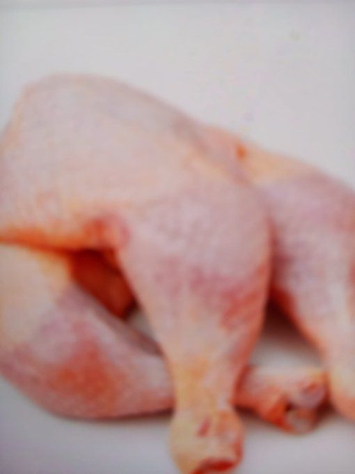 Cuisse de poulet avec dos congelé 